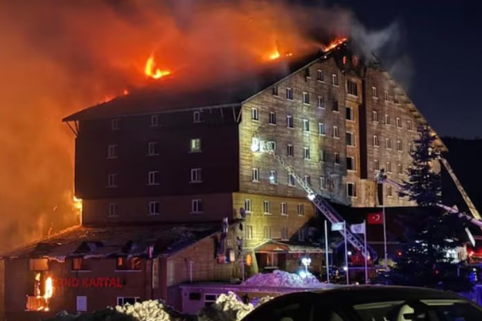 Flames engulf the Grand Kartal Hotel at Kartalkaya Ski Resort, Turkey, during a devastating fire that claimed 66 lives. Fire engulfing the Grand Kartal Hotel in Turkey's Kartalkaya ski resort